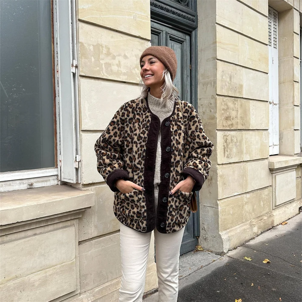 A women's patterned jacket with a bold statement design, styled with a chic outfit, perfect for adding a touch of confidence and unique flair to casual or semi-formal looks.