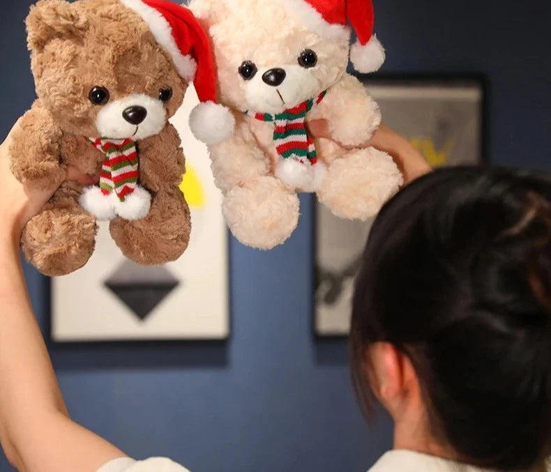 Adorable plush bear set wearing festive hats and scarves, perfect for holiday decorations or as cuddly gifts, displayed on a table with a cozy setup.