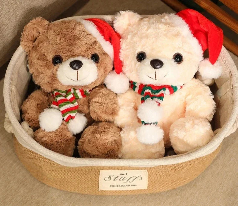 Adorable plush bear set wearing festive hats and scarves, perfect for holiday decorations or as cuddly gifts, displayed on a table with a cozy setup.