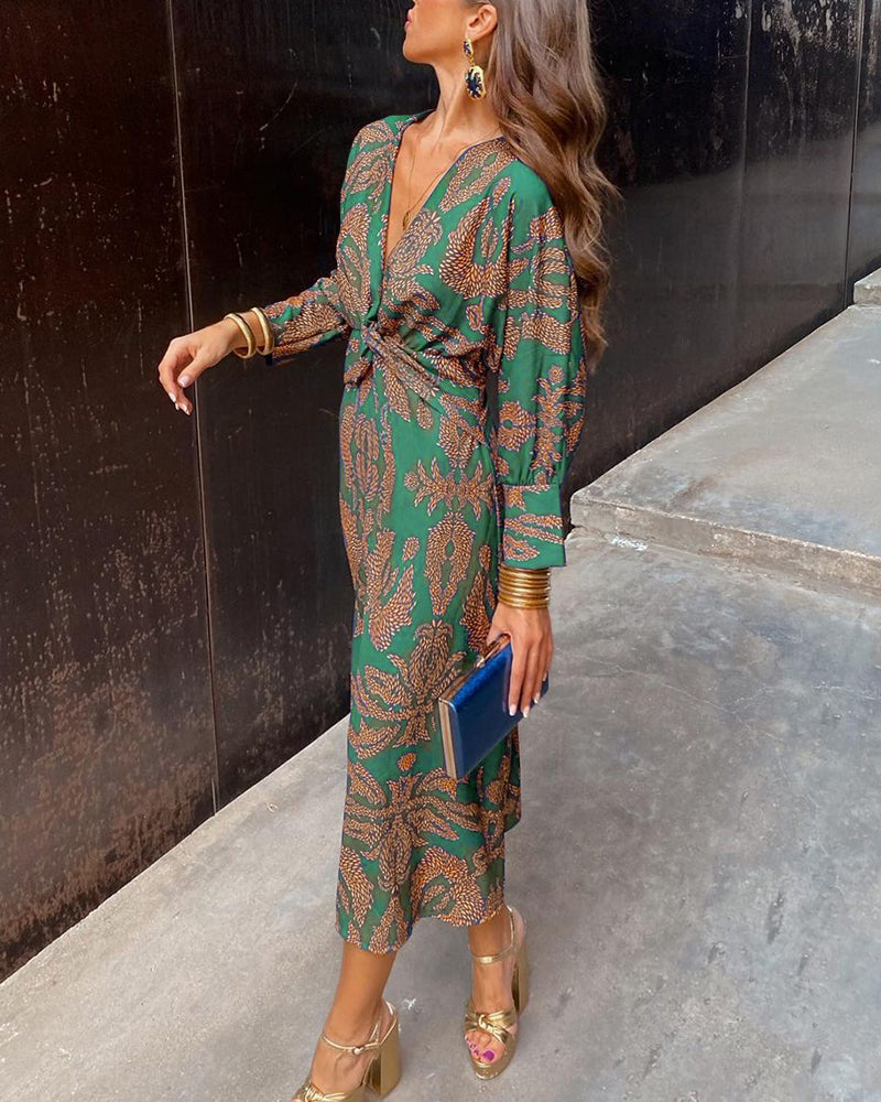 A woman wearing a floral maxi dress with an elegant fit, styled with statement accessories and heels, perfect for formal events or casual outings.