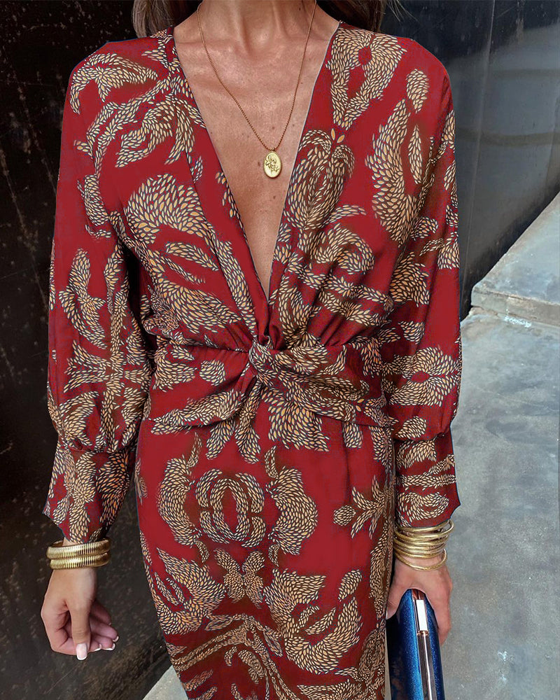 A woman wearing a floral maxi dress with an elegant fit, styled with statement accessories and heels, perfect for formal events or casual outings.