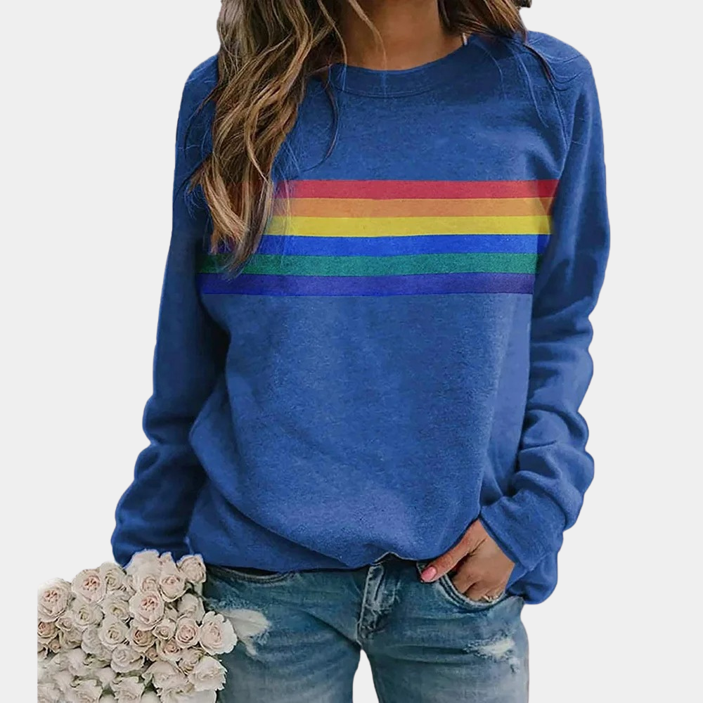 Women's striped sweatshirt with a casual fit, featuring a vibrant horizontal stripe design, styled with distressed jeans and accessorized with a bouquet.