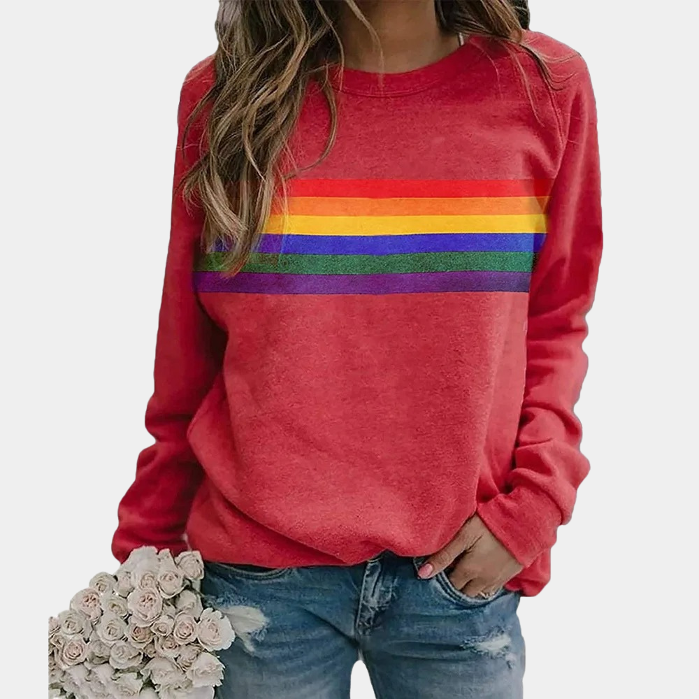 Women's striped sweatshirt with a casual fit, featuring a vibrant horizontal stripe design, styled with distressed jeans and accessorized with a bouquet.