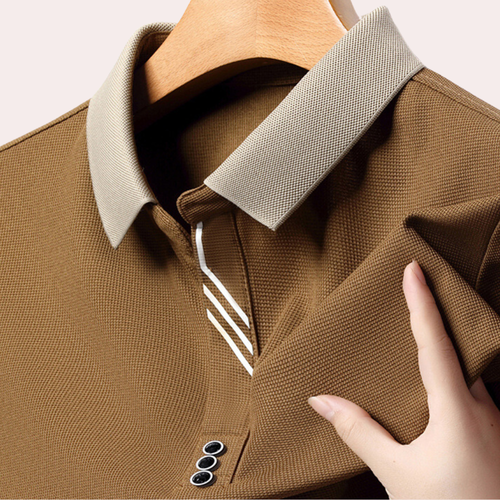 Men's classic polo shirt featuring a modern design with a sleek collar and button details, perfect for casual or semi-formal occasions.