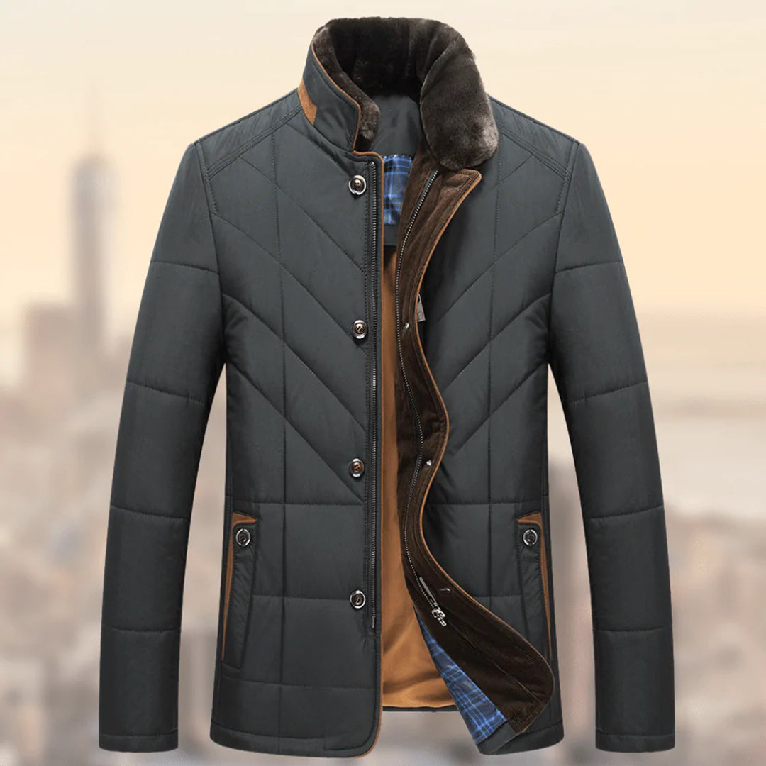 Men's quilted jacket with a high collar, button-up front, and soft inner lining displayed on a neutral background, showcasing its warm and stylish design.