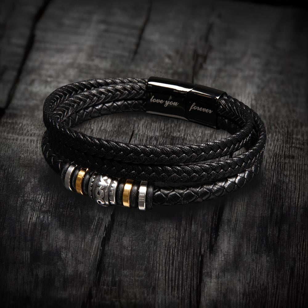 Men's multi-strand bracelet featuring a layered design with intricate details, worn on the wrist to showcase its modern and stylish appearance.