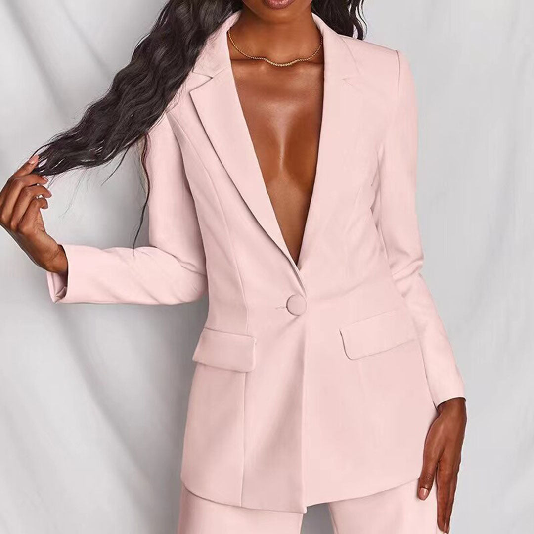 Elegant women's tailored suit set featuring a blazer and matching trousers, designed for a formal and sophisticated look.