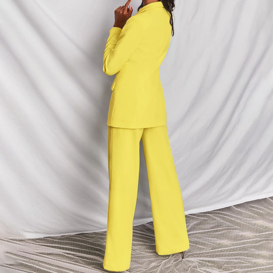 Elegant women's tailored suit set featuring a blazer and matching trousers, designed for a formal and sophisticated look.