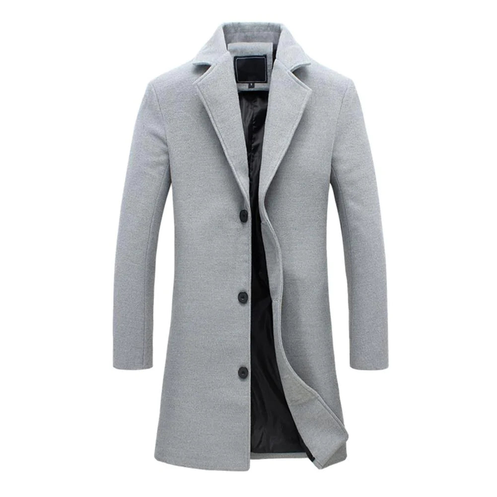 Long tailored overcoat with button closure, designed for a sleek and timeless look, displayed on a neutral background.