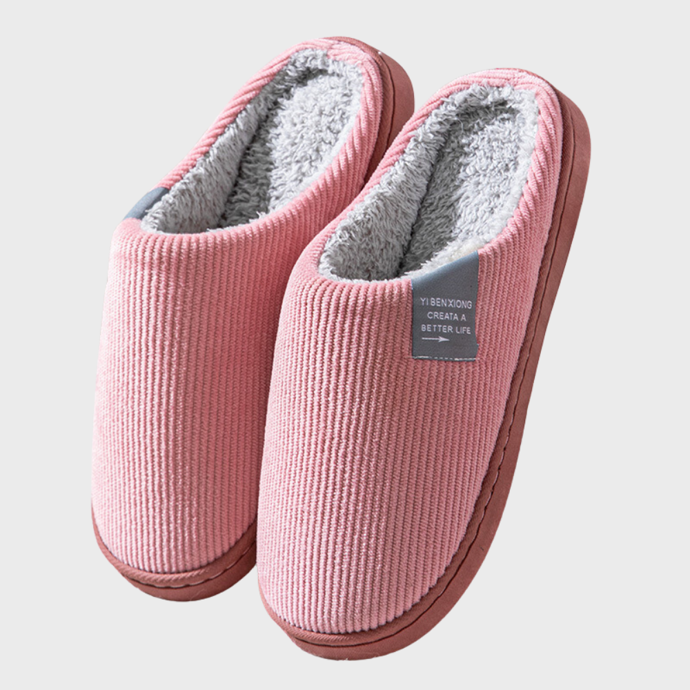 Women's soft slippers with a plush interior and a durable sole, designed for ultimate comfort and everyday wear at home.