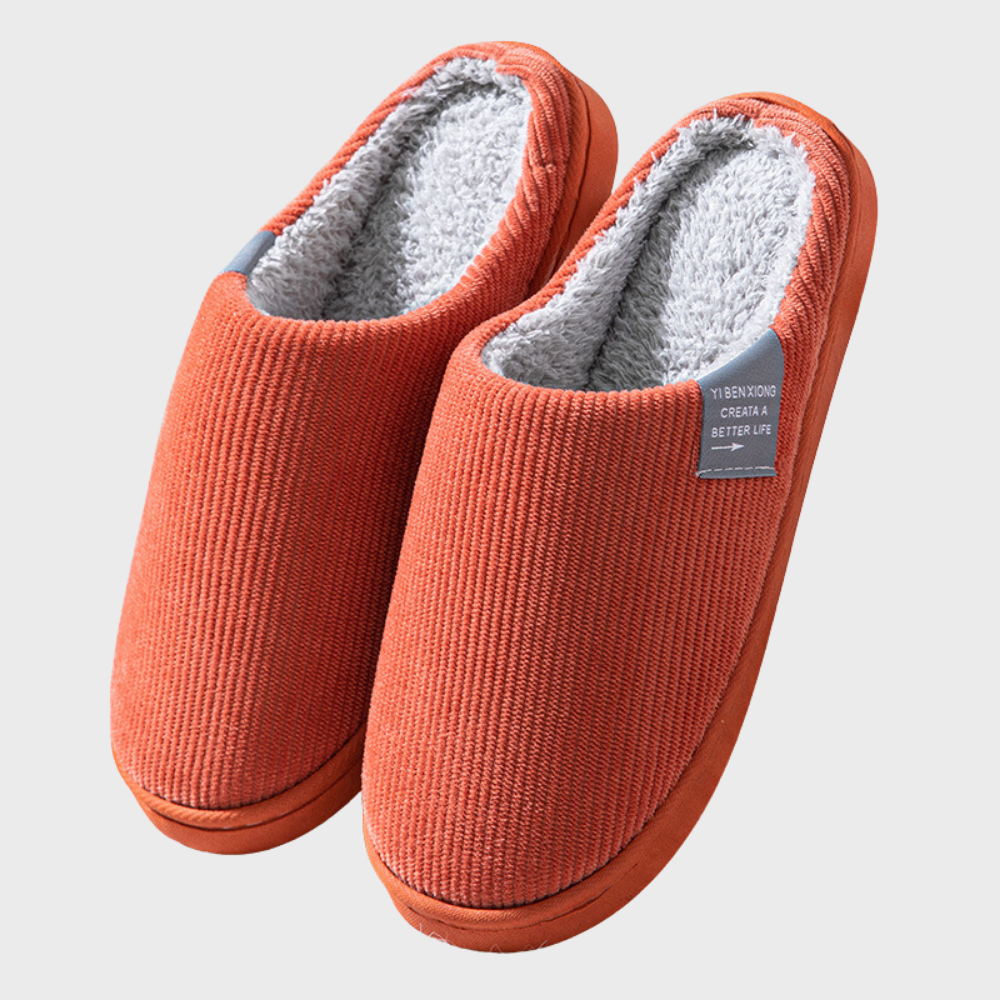 Women's soft slippers with a plush interior and a durable sole, designed for ultimate comfort and everyday wear at home.
