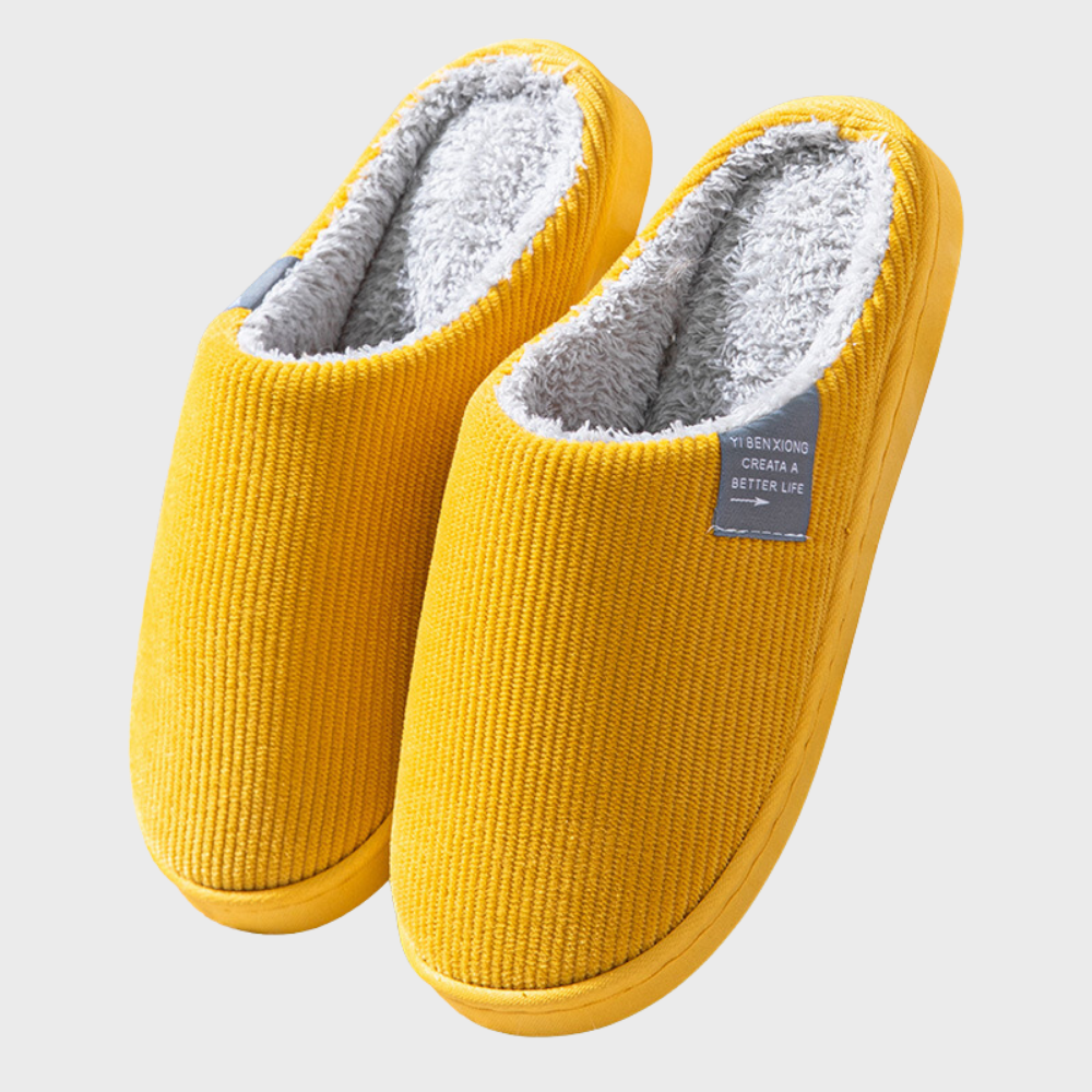 Women's soft slippers with a plush interior and a durable sole, designed for ultimate comfort and everyday wear at home.