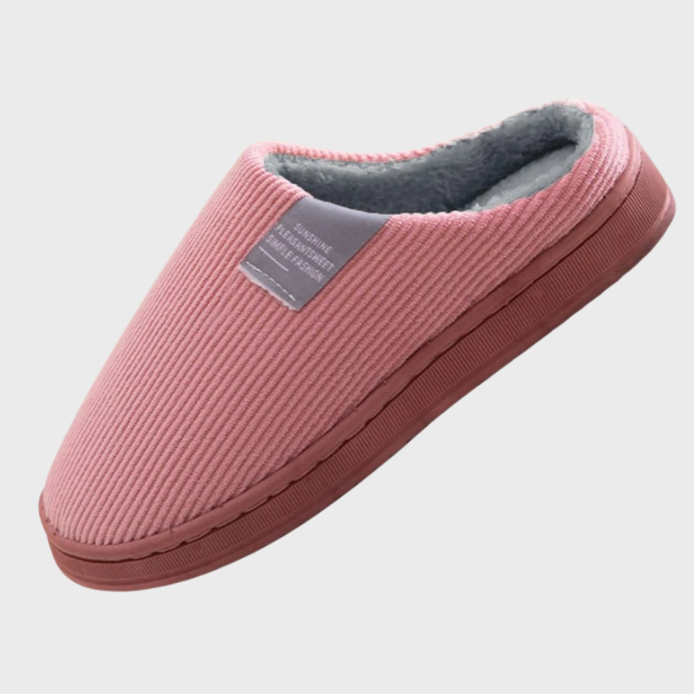 Women's soft slippers with a plush interior and a durable sole, designed for ultimate comfort and everyday wear at home.