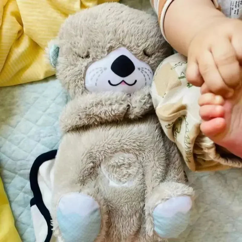 Adorable plush koala toy holding a festive pumpkin with a glowing face, designed to add charm and warmth to any holiday or celebration setting.
