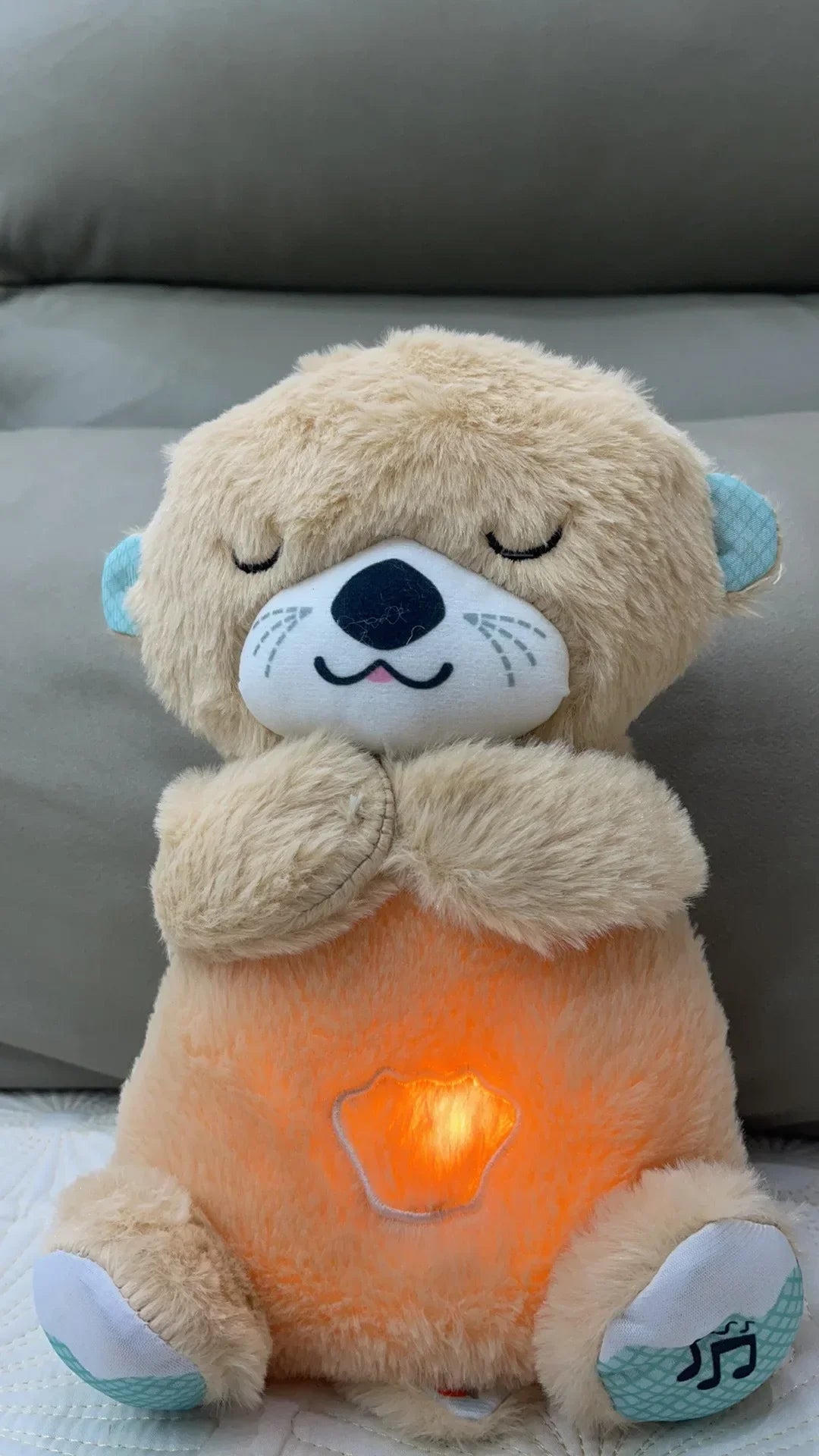 Adorable plush koala toy holding a festive pumpkin with a glowing face, designed to add charm and warmth to any holiday or celebration setting.