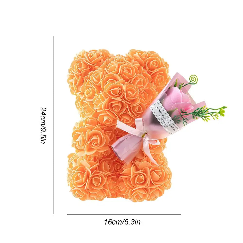 A decorative flower bear crafted from intricate faux roses, presented with an elegant bouquet and housed in a stylish gift box, perfect for special occasions or as a timeless keepsake.