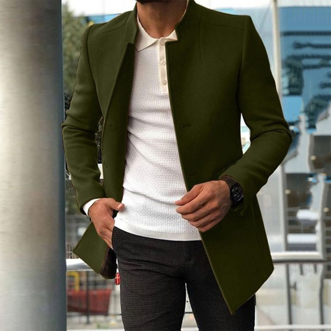 Men's tailored coat with a sleek and sophisticated design, styled over a casual shirt and trousers, perfect for formal or smart-casual occasions.