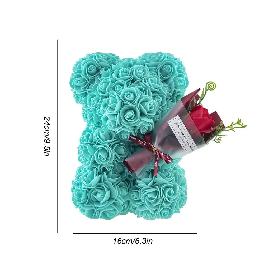 A decorative flower bear crafted from intricate faux roses, presented with an elegant bouquet and housed in a stylish gift box, perfect for special occasions or as a timeless keepsake.