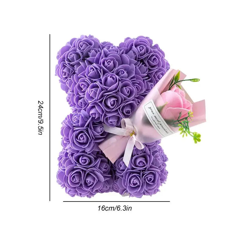 A decorative flower bear crafted from intricate faux roses, presented with an elegant bouquet and housed in a stylish gift box, perfect for special occasions or as a timeless keepsake.