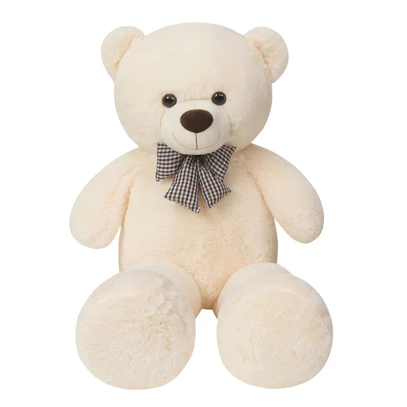 A giant plush bear with a huggable design, featuring soft fabric and an adorable bow, perfect for cuddles, decoration, or as a thoughtful gift for all ages.