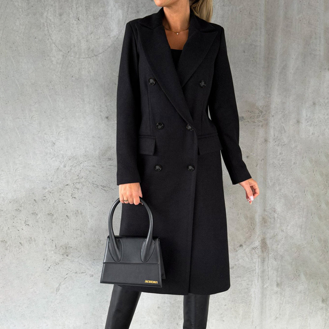 Women's classic long coat featuring a tailored fit, double-breasted buttons, and a chic design, perfect for casual and formal occasions.