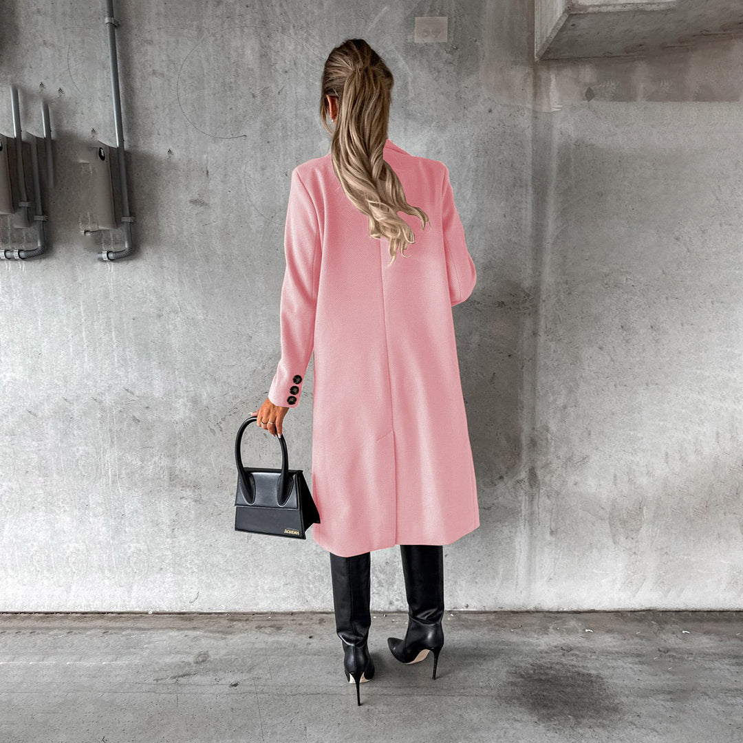 Women's classic long coat featuring a tailored fit, double-breasted buttons, and a chic design, perfect for casual and formal occasions.