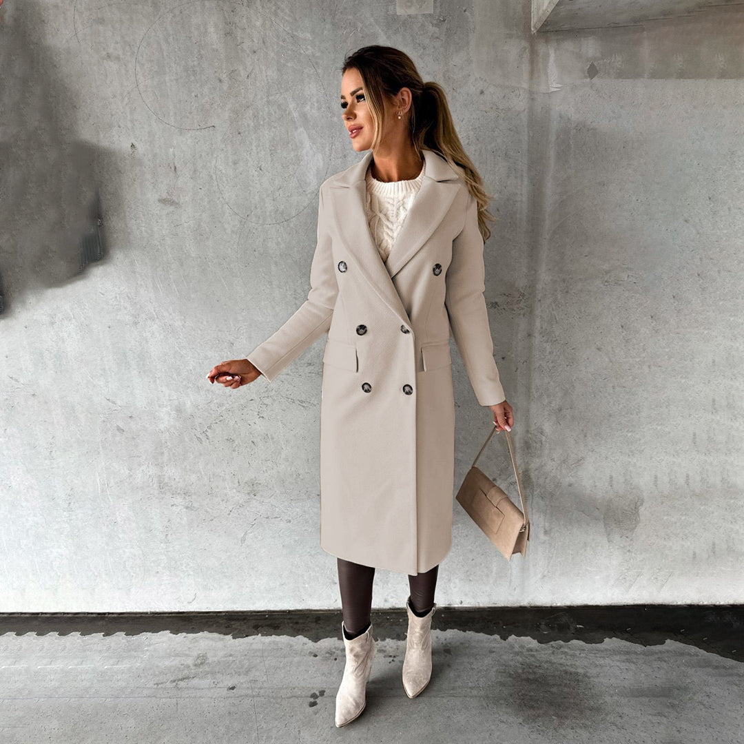 Women's classic long coat featuring a tailored fit, double-breasted buttons, and a chic design, perfect for casual and formal occasions.