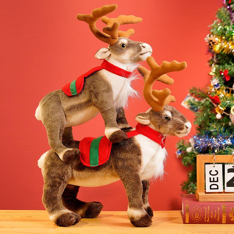 Festive plush reindeer set featuring two reindeer stacked playfully, displayed in a holiday-themed setting with decorations and gifts.