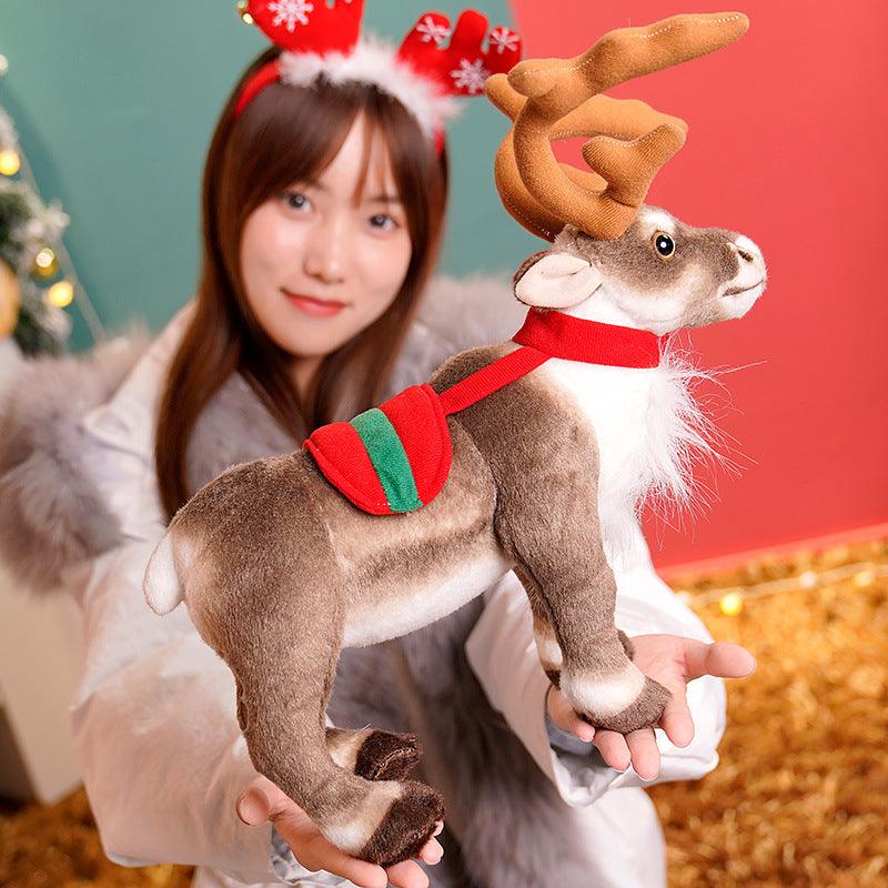 Festive plush reindeer set featuring two reindeer stacked playfully, displayed in a holiday-themed setting with decorations and gifts.
