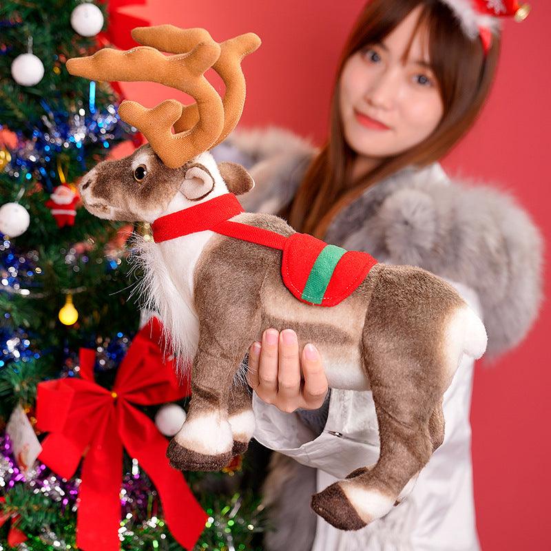 Festive plush reindeer set featuring two reindeer stacked playfully, displayed in a holiday-themed setting with decorations and gifts.