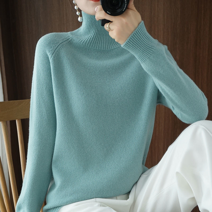 A women's turtleneck sweater featuring an elegant style and sleek design, perfect for casual wear or layering for a sophisticated look.