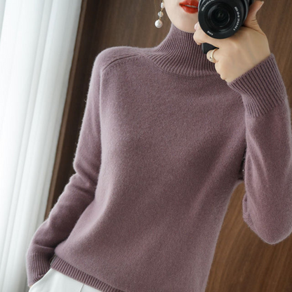 A women's turtleneck sweater featuring an elegant style and sleek design, perfect for casual wear or layering for a sophisticated look.