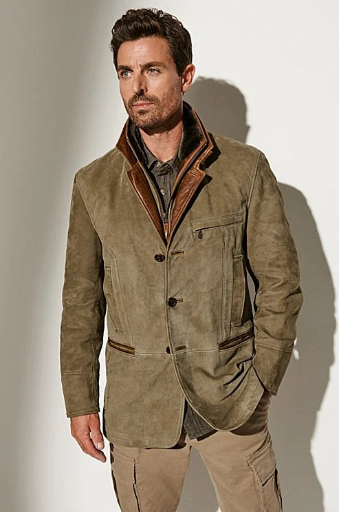 A men's suede blazer featuring a refined design with tailored details, perfect for formal events or smart-casual outings, exuding timeless elegance and sophistication.