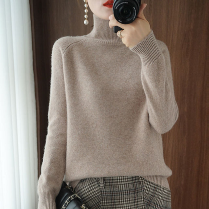 A women's turtleneck sweater featuring an elegant style and sleek design, perfect for casual wear or layering for a sophisticated look.