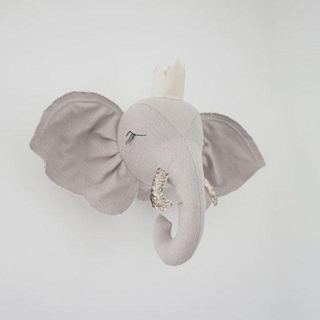 A decorative elephant wall hanging with an elegant design, featuring detailed craftsmanship and a whimsical touch, perfect for nurseries, kids' rooms, or as unique home decor.