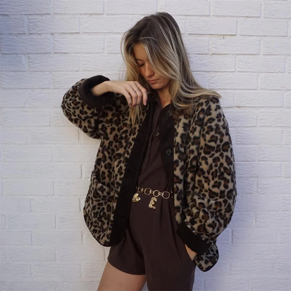A women's patterned jacket with a bold statement design, styled with a chic outfit, perfect for adding a touch of confidence and unique flair to casual or semi-formal looks.