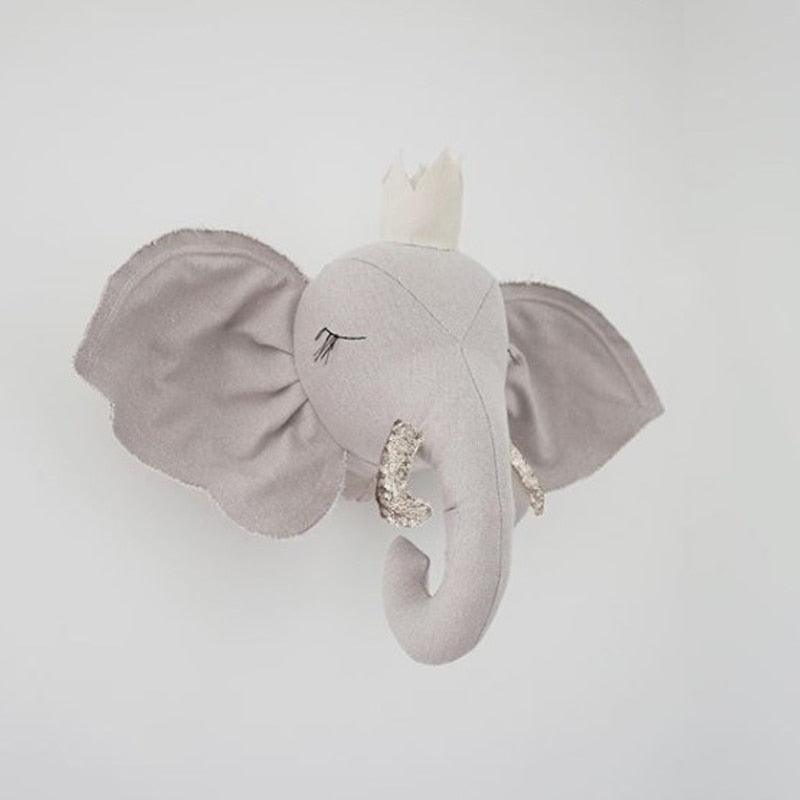 A decorative elephant wall hanging with an elegant design, featuring detailed craftsmanship and a whimsical touch, perfect for nurseries, kids' rooms, or as unique home decor.