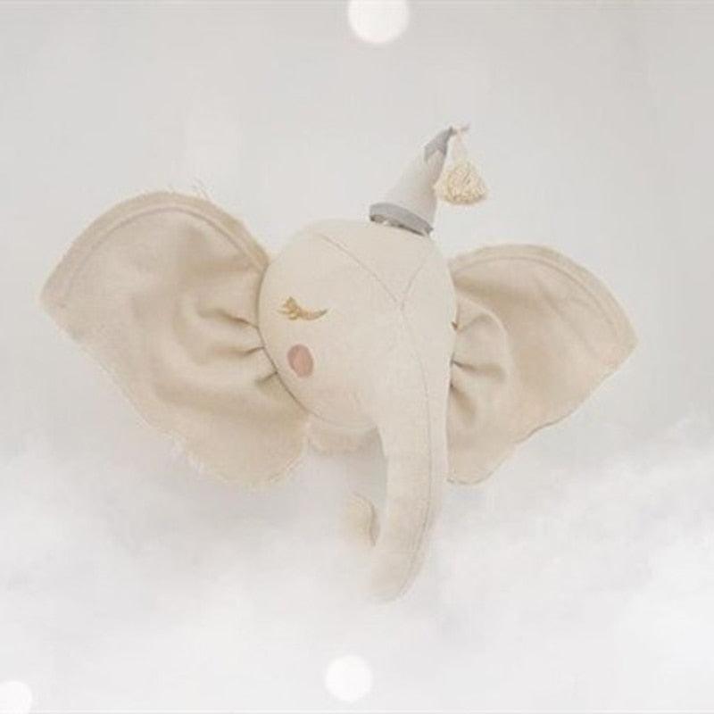 A decorative elephant wall hanging with an elegant design, featuring detailed craftsmanship and a whimsical touch, perfect for nurseries, kids' rooms, or as unique home decor.