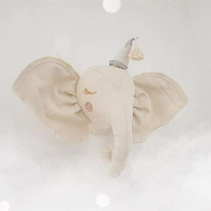 A decorative elephant wall hanging with an elegant design, featuring detailed craftsmanship and a whimsical touch, perfect for nurseries, kids' rooms, or as unique home decor.