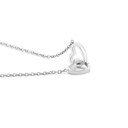 Elegant interlocking necklace displayed in a luxurious jewelry box, highlighting its timeless and sophisticated design.