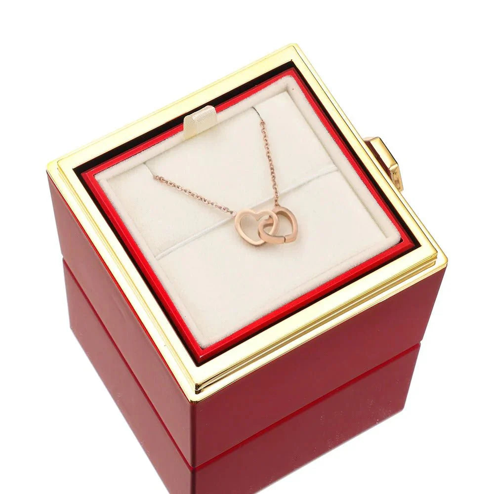 Elegant interlocking necklace displayed in a luxurious jewelry box, highlighting its timeless and sophisticated design.
