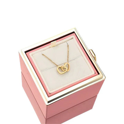 Elegant interlocking necklace displayed in a luxurious jewelry box, highlighting its timeless and sophisticated design.