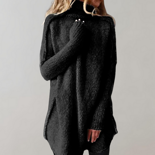 Women's cozy knit sweater with a relaxed fit, high neck, and long sleeves, designed for ultimate comfort and casual elegance.