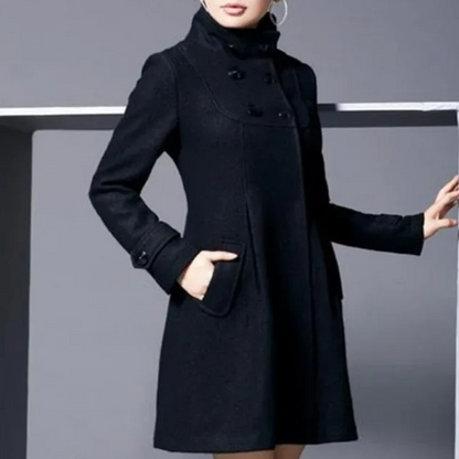 Elegant women's coat with a tailored fit and sophisticated design, featuring a high collar and button details for a timeless and refined look.