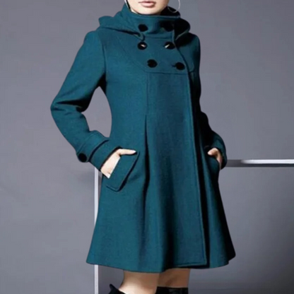 Elegant women's coat with a tailored fit and sophisticated design, featuring a high collar and button details for a timeless and refined look.