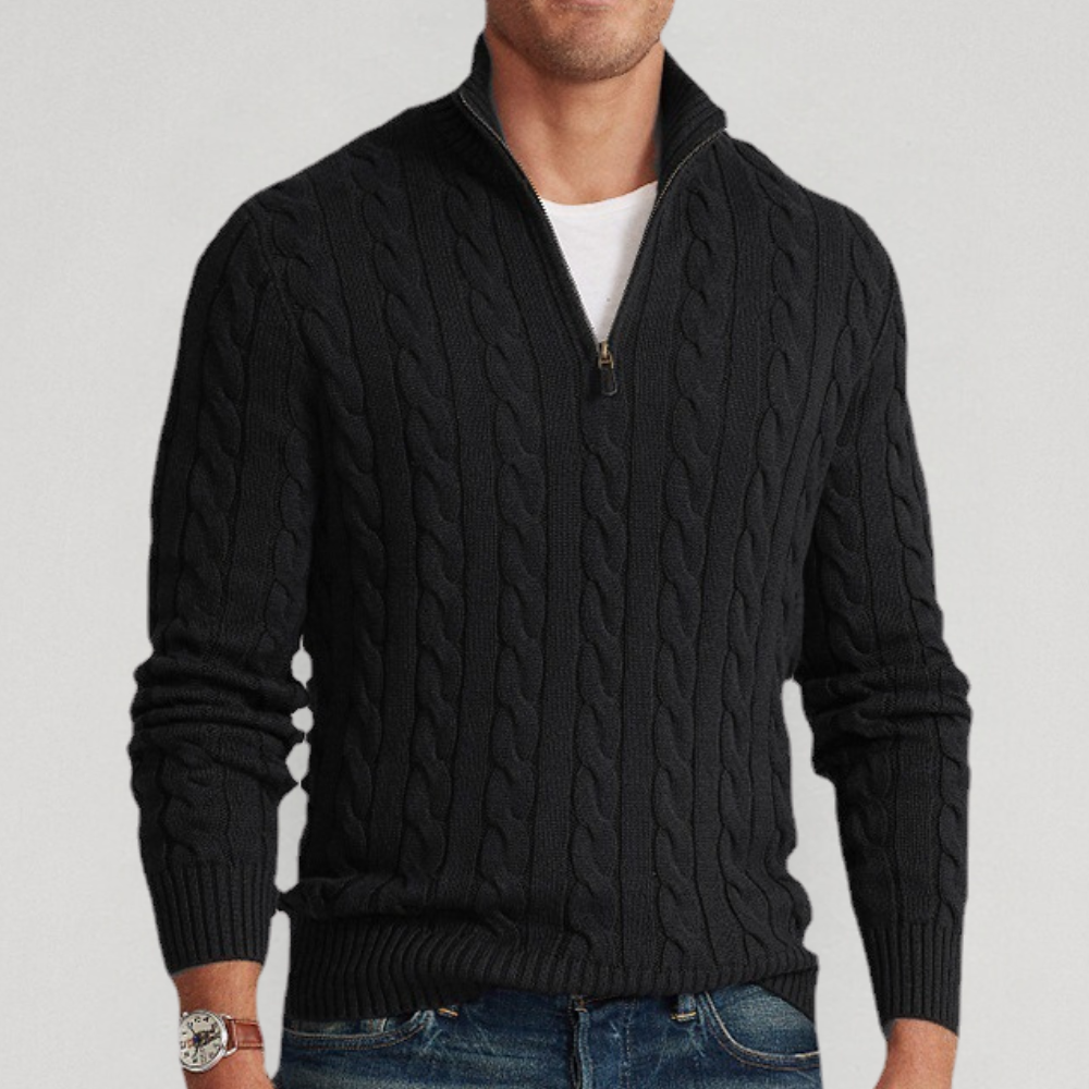 A men's cable knit sweater featuring a classic design with a zip-up collar, tailored for warmth and style, perfect for casual wear or layering in colder weather.