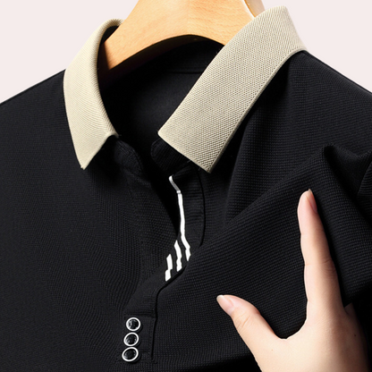 Men's classic polo shirt featuring a modern design with a sleek collar and button details, perfect for casual or semi-formal occasions.