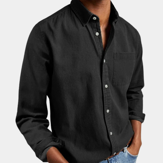 A stylish men's long-sleeve classic shirt with a button-up front and a chest pocket, perfect for both casual and formal occasions. Designed for a comfortable and polished look.