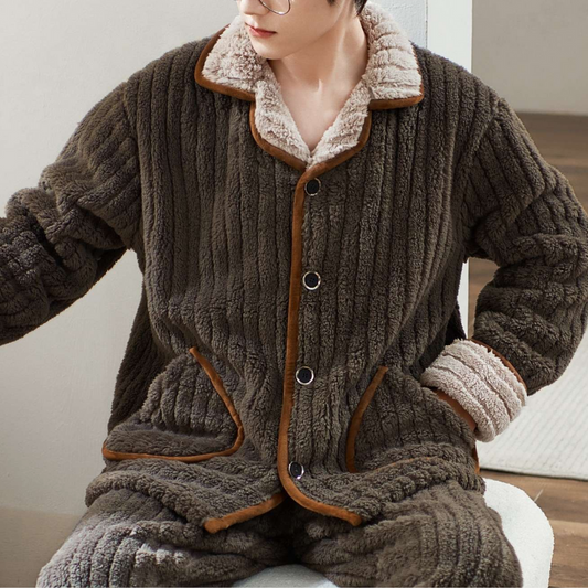 Cozy men's loungewear set featuring a button-up top with pockets and matching relaxed-fit pants, perfect for comfort and casual homewear.