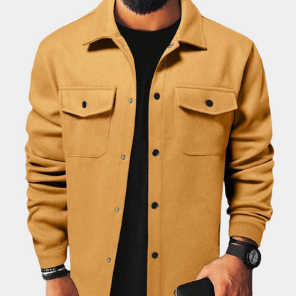 Men's stylish shirt jacket with a modern design, featuring functional pockets and snap button closures, perfect for versatile casual and smart-casual looks.